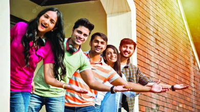 cheerful indian asian young group college students friends laughing together while sitting standing walking campus 466689 7738 1