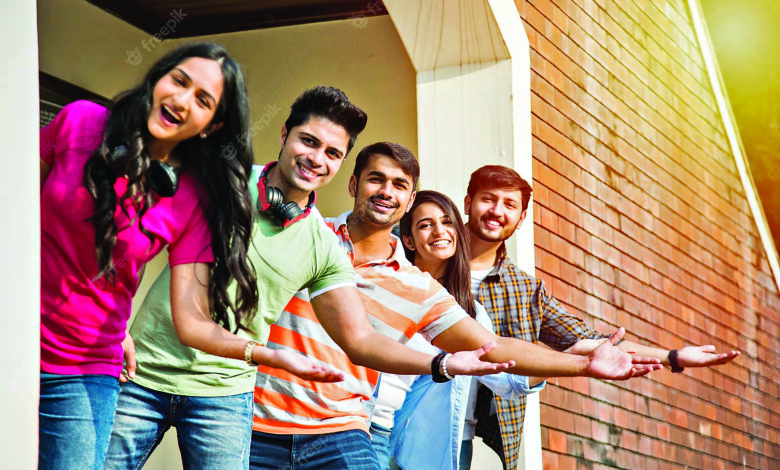 cheerful indian asian young group college students friends laughing together while sitting standing walking campus 466689 7738 1